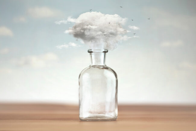 conceptual image of freedom with a cloud coming out of a vase that contained it